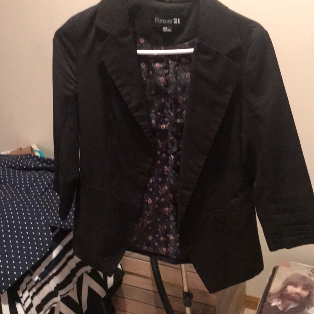 Blazer with floral lining.